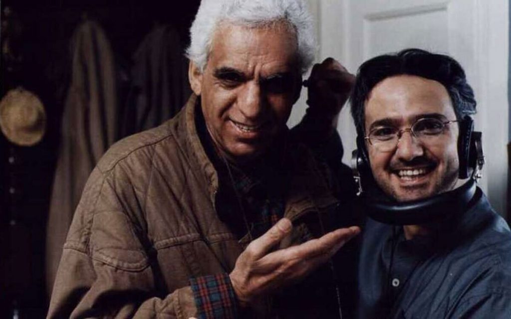 محمدرضا فروتن و کیومرث پوراحمد در پشت صحنه فیلم شب یلدا