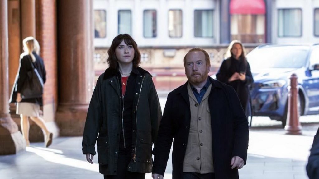 Adrian Scarborough as DI Max Arnold and Vanessa Emme as DS Layla Walsh in The Chelsea Detective Season 2 6